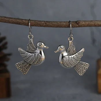 Винтажные серьги-подвески в виде птиц: идеальный подарок для мужчин и женщин по любому поводу!